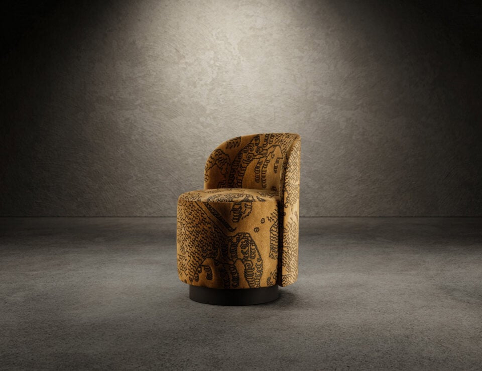 Leather and wood swivel dining chair with patterned upholstery