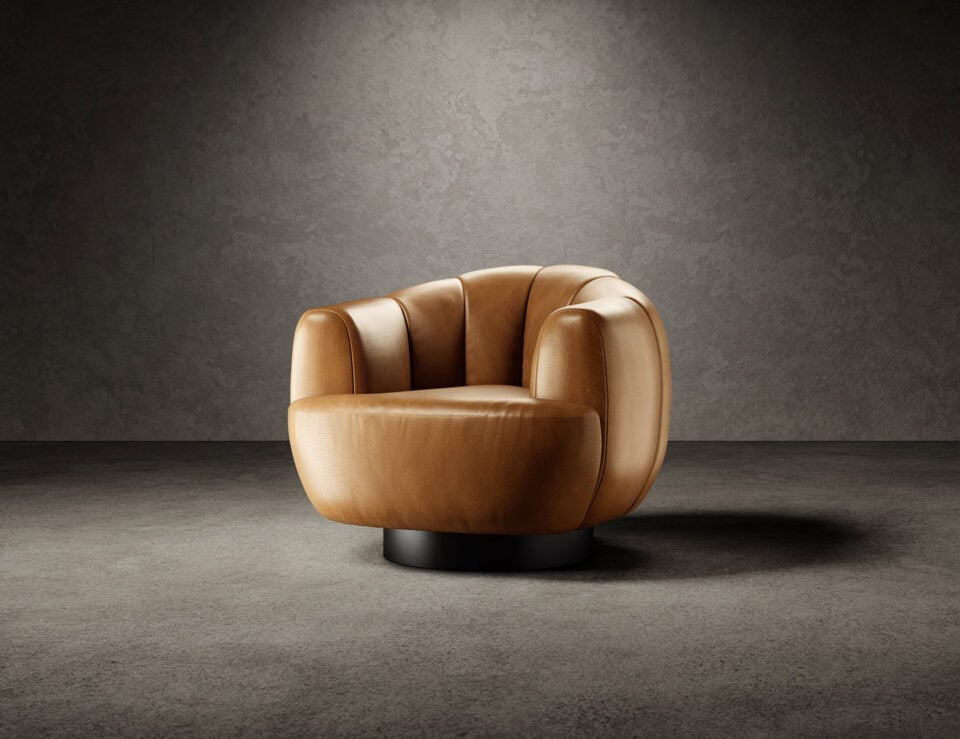 Leather swivel armchair with wood base in a living room setting