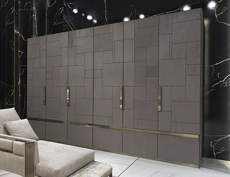 Large wood wardrobe with geometric panel doors and metal handles