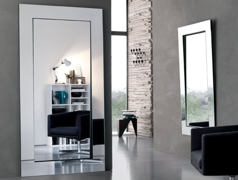Large rectangular wall mirror with wide glass frame