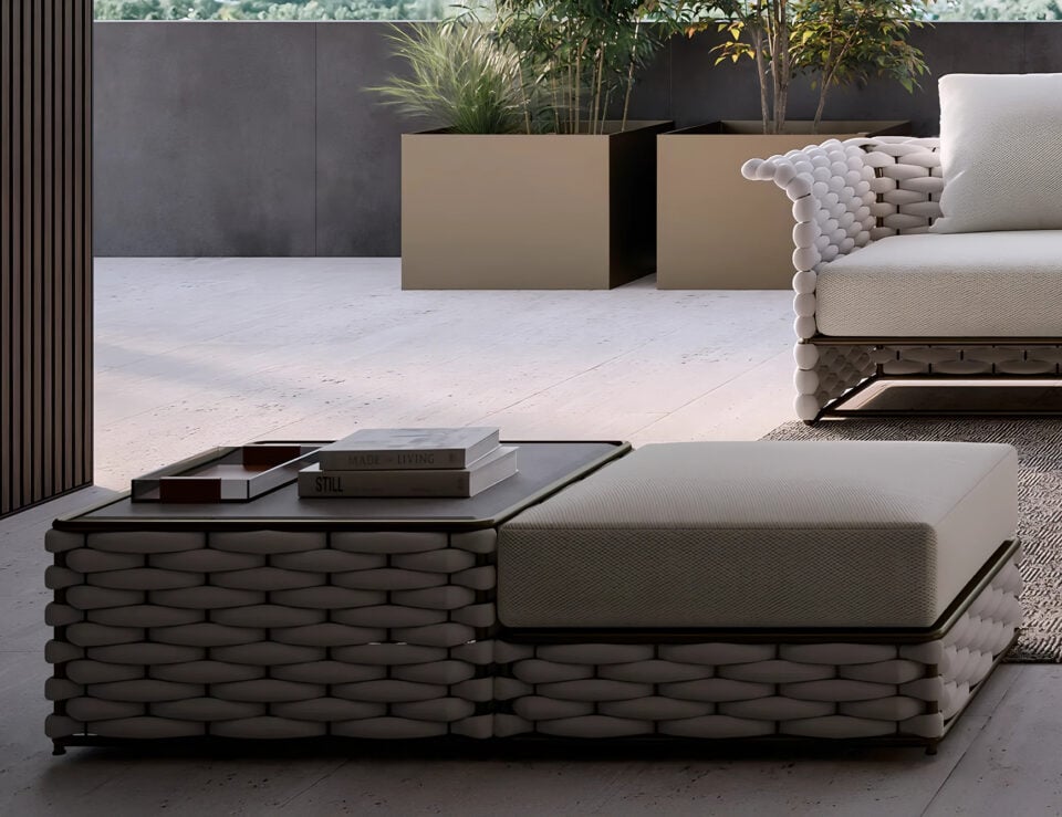 Fabric outdoor pouf with woven base and cushion top