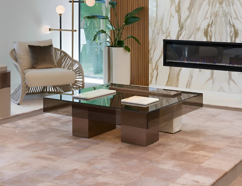 Rectangular glass and metal coffee table in a living room setting