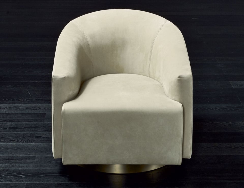 Beige leather swivel sofa chair