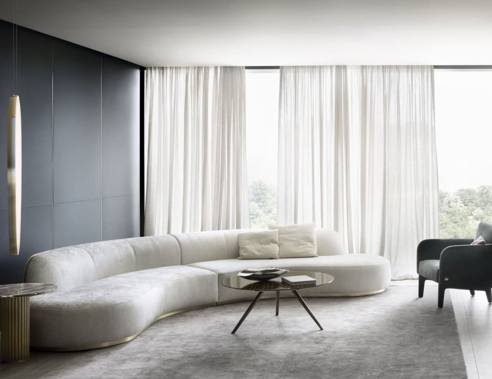 Curved leather sectional sofa in living room