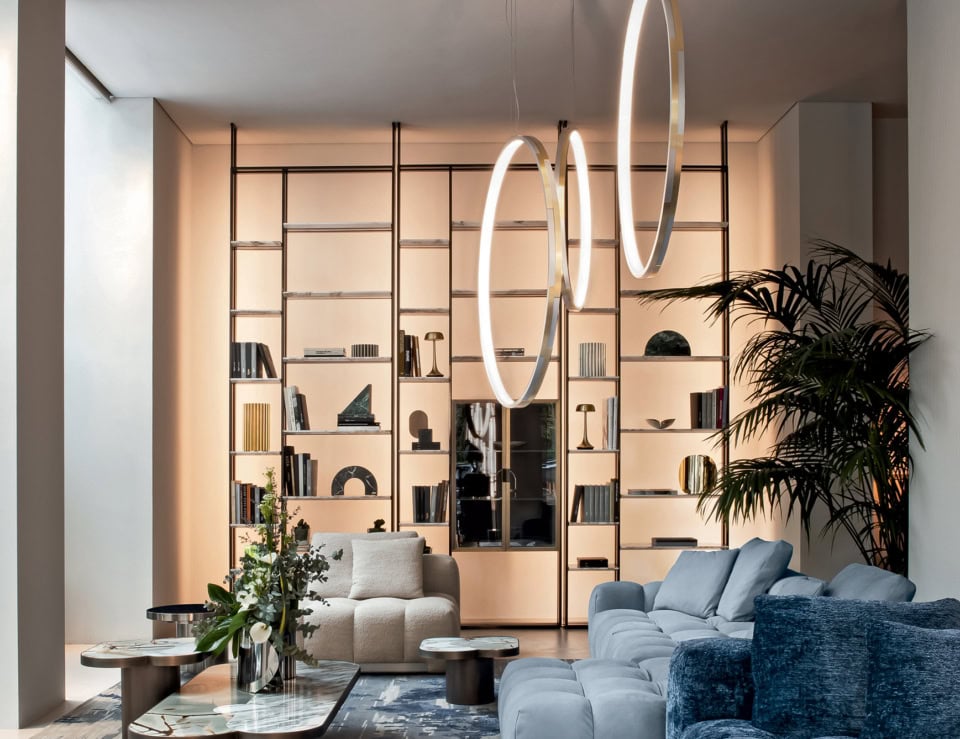Leather bookcase with open shelving used in a living room setting