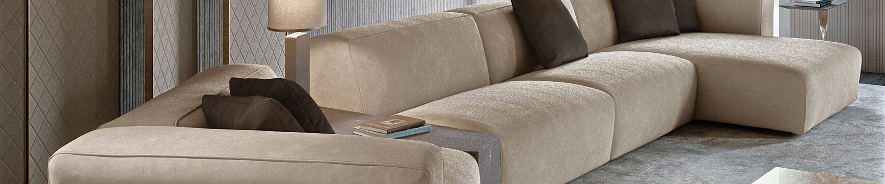 Beige fabric sectional sofa with brown cushions in living room