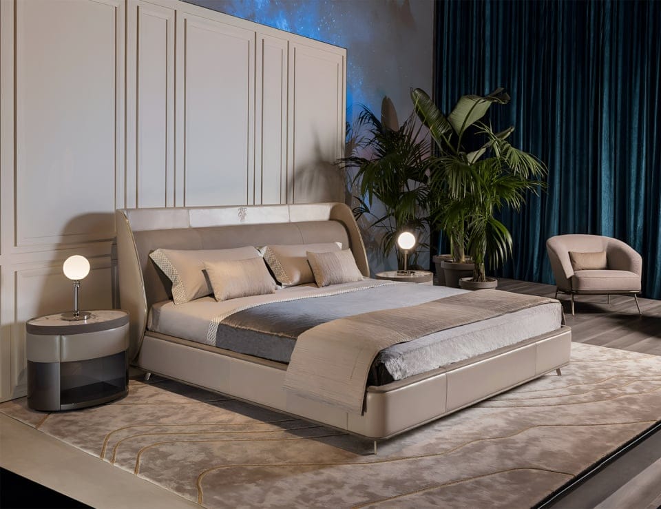 Leather upholstered bed with headboard in bedroom setting